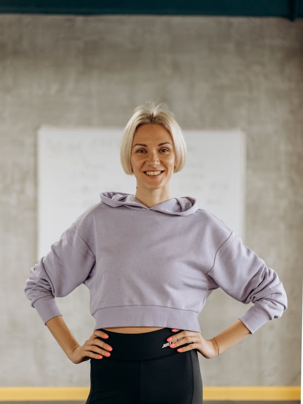 Confident woman in activewear smiling