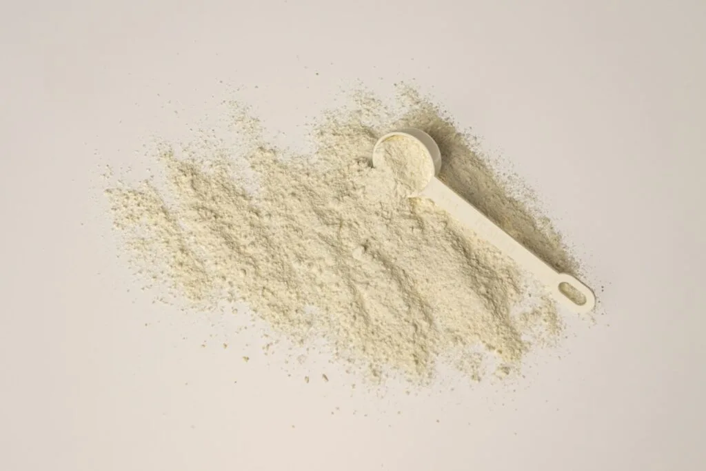 A scoop of collagen powder on a clean background — getting your daily dosage right