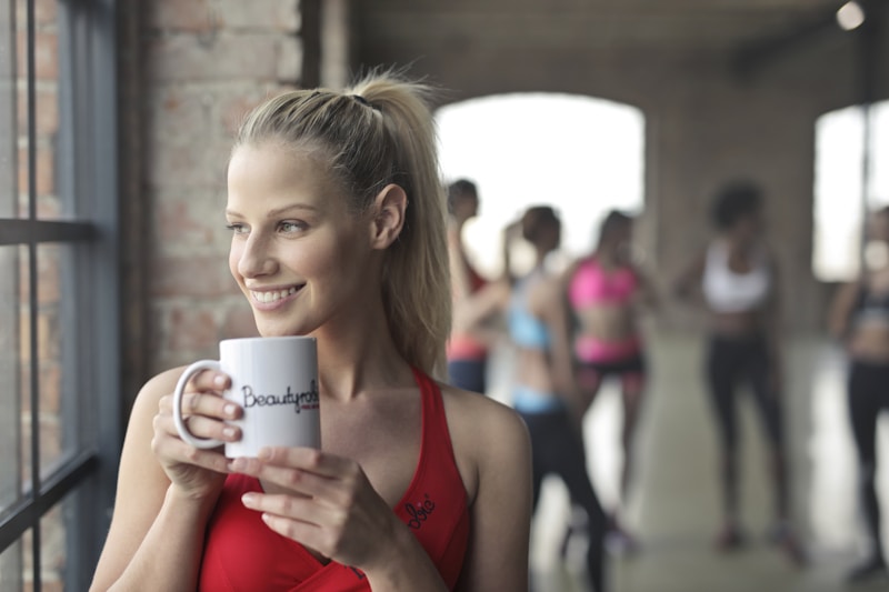 Woman enjoying her morning wellness routine — starting the day right
