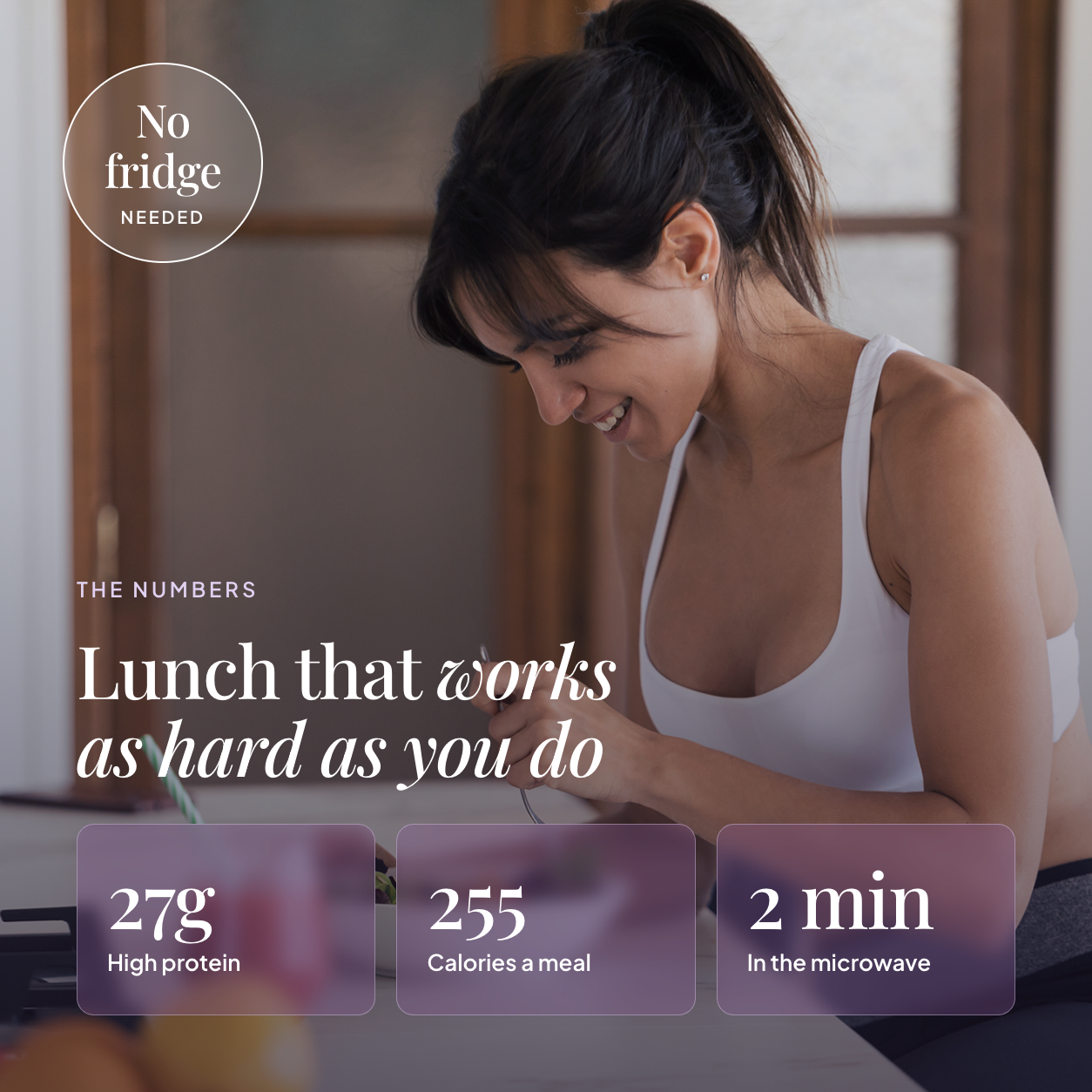 Woman eating an EatProtein Italian beef stew ready meal at home — 27g protein, 255 calories a meal, 2 minutes in the microwave